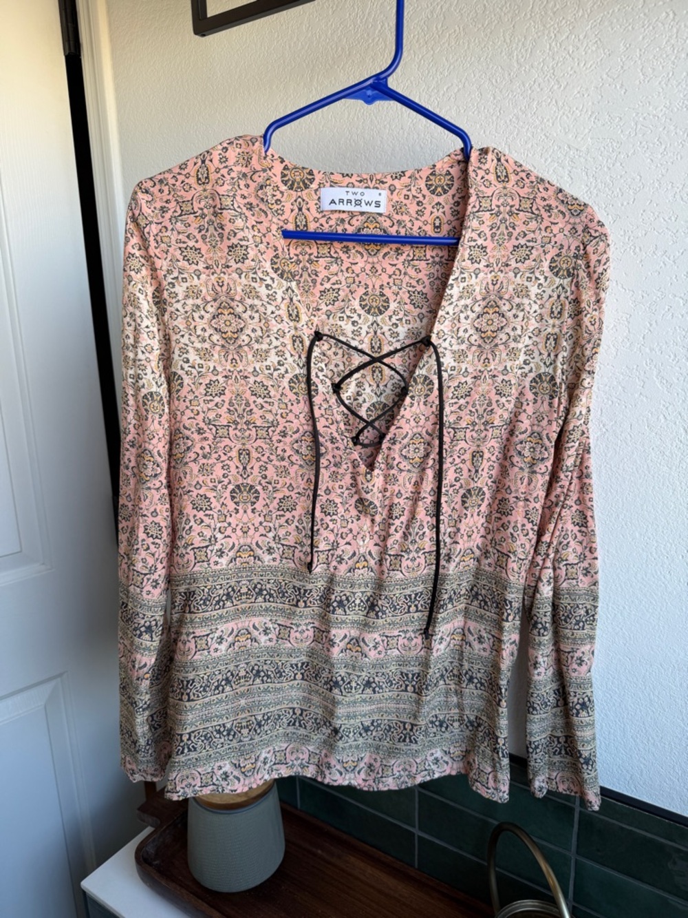 Two Arrows. Lace up top. Like new. Small.
